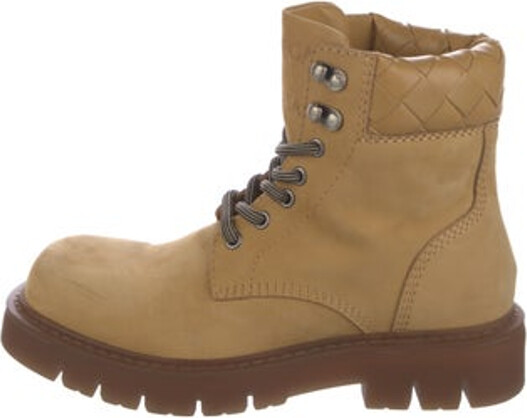 Bottega Veneta Leather Ankle Combat Boots Brown & Neutrals Round-Toes Lace-Up Closure at Uppers Includes Dust Bag Size not listed estimated from measurements. Unfortunately due to restrictions this item may not be eligible for shipping in all areas.