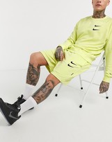 Thumbnail for your product : Nike Swoosh logo shorts in neon yellow