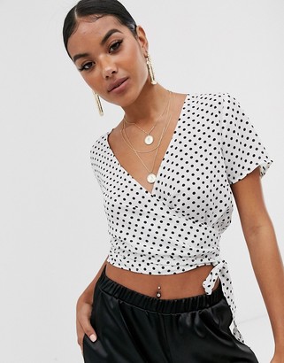 NA-KD polka dot wrap front crop top in white