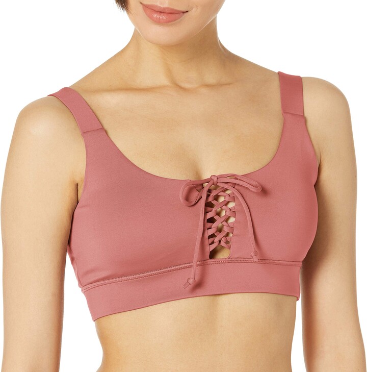 https://img.shopstyle-cdn.com/sim/94/3d/943dbf4812edb0d3da88607da6701020_best/guess-womens-active-medium-support-sports-bra-with-lace-up-detail.jpg