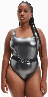 Calvin Klein swimwear to hide belly bulge