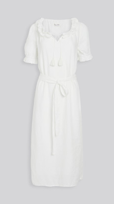 white linen ruffle dress