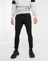 Thumbnail for your product : ASOS DESIGN super skinny joggers in black with silver zip cuffs
