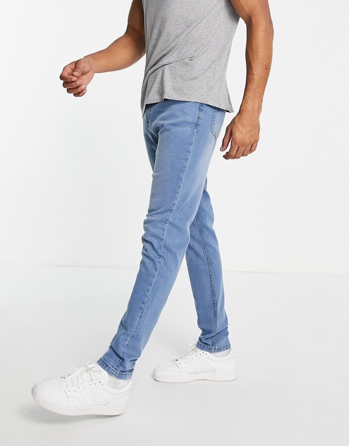 LDN DNM carrot fit jeans in stone washed blue - ShopStyle