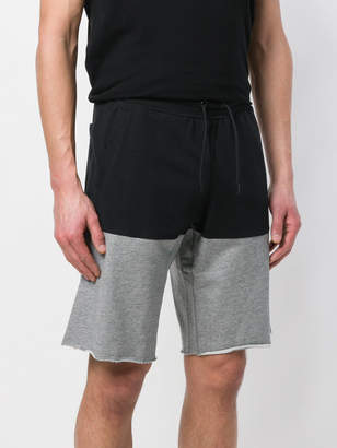 Nike colour block raw edge shorts