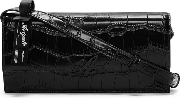 axel arigato croc effect