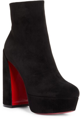 black platform louboutins