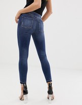 Thumbnail for your product : Spanx shape and lift distressed skinny jeans