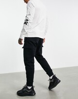 Thumbnail for your product : Nike Club Fleece cuffed cargo sweatpants in black - BLACK