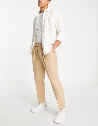 Topman relaxed warm handle trousers with double pleat in stone - ShopStyle  Chinos & Khakis