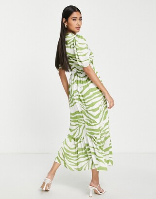 NEVER FULLY DRESSED zebra print midi dress in green