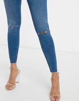 Thumbnail for your product : ASOS DESIGN DESIGN high-rise ridley 'skinny' jeans in mid blue with rips