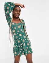 Thumbnail for your product : ASOS Tall ASOS DESIGN Tall mini tea dress with long sleeves and cup detail in forest green floral