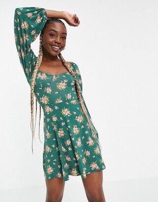 ASOS Tall ASOS DESIGN Tall mini tea dress with long sleeves and cup detail in forest green floral