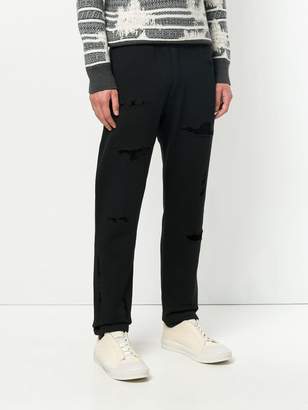 Alexander McQueen distressed track pant