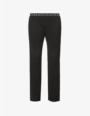 Off-White Bold branded wide-leg stretch-knit trousers