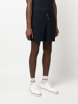 Thumbnail for your product : Thom Browne University stripe-print track shorts