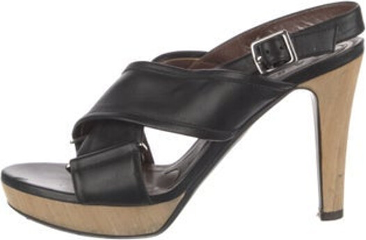 Marni Leather Slingback Sandals Black Cutout Accent Platform Crossover Straps & Buckle Closure at Ankles Unfortunately, due to restrictions, this item may not be eligible for shipping in all areas.