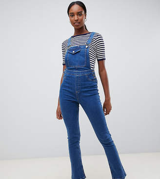 ASOS DESIGN Tall denim dungaree with kickflare in midwash blue