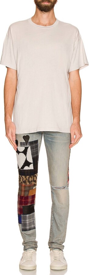 Amiri Art Patch Denim Jeans In Clay Indigo