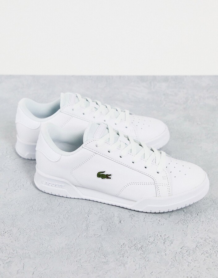 Lacoste Twin Serve 0721 leather lace up trainers in white - ShopStyle