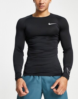 Nike Training Nike Pro Training long sleeve base layer top in black -  ShopStyle Activewear Shirts