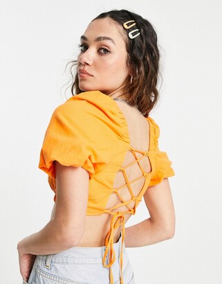 Bershka puff sleeve crop top with lace up back in orange - ShopStyle