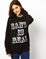 Thumbnail for your product : ASOS Sweatshirt with Santa is Real Glitter Holidays Print