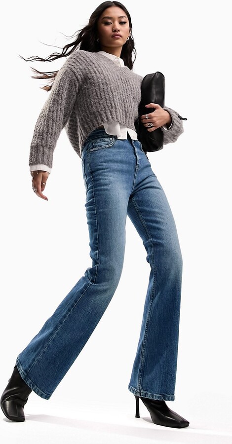 ASOS DESIGN flared jeans in dark blue - ShopStyle