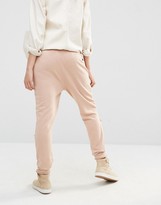 Thumbnail for your product : Missguided Tall Distressed Knee Track Pants