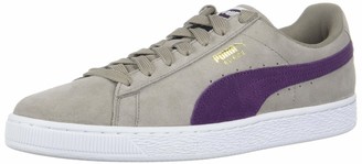 purple and white puma sneakers
