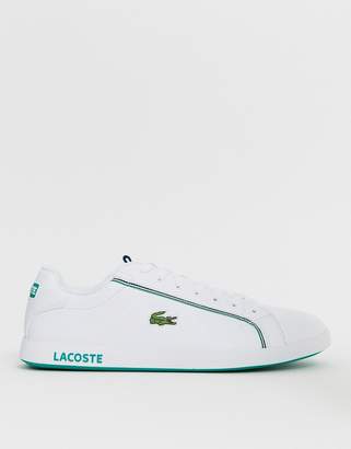 Lacoste graduate trainer in white/green