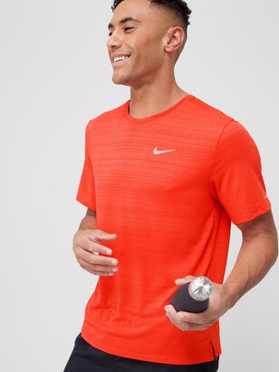coral nike shirt