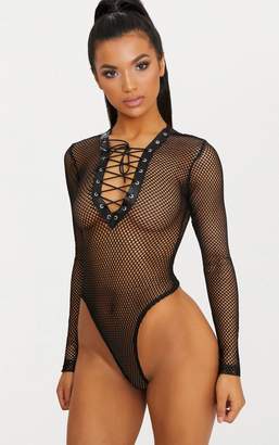 PrettyLittleThing Black Fishnet Lace Up Thong Bodysuit