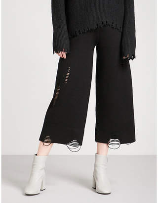 Mo&Co. Distressed wide-leg wool trousers