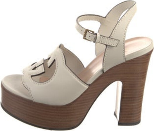 Gucci Leather Sandals Neutrals Interlocking G Logo Platform Straps & Buckle Closure at Ankles Includes Dust Bag Unfortunately, due to restrictions, this item may not be eligible for shipping in all areas.