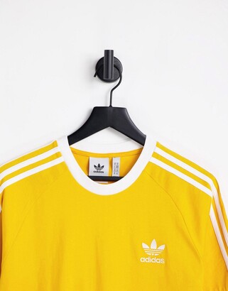 adidas adicolor three stripe t-shirt in yellow - ShopStyle