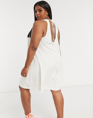 ASOS Curve DESIGN Curve swing mini dress with embroidery detail and tie back in ivory