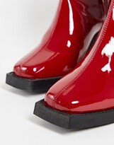 Thumbnail for your product : ASOS DESIGN heeled chelsea boots in red patent faux leather with black sole