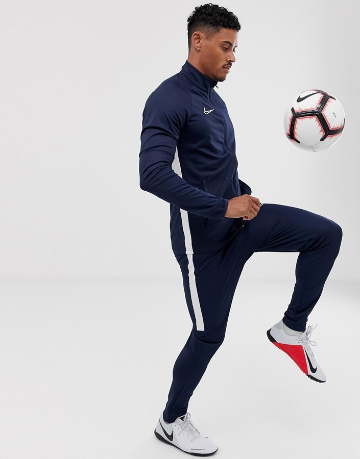 navy and grey nike tracksuit