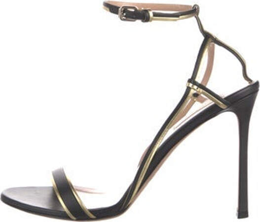 Valentino Leather Sandals Black Rockstud Accents Wrap-Around Straps & Buckle Closure at Ankles Includes Dust Bag Unfortunately, due to restrictions, this item may not be eligible for shipping in all areas.