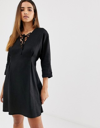ASOS DESIGN mini dress in linen with lace up