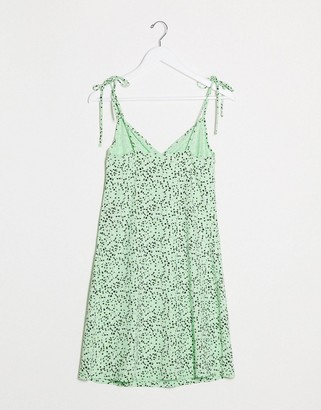 Noisy May swing dress with tie cami sleeves in green spot print