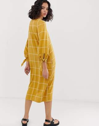 NATIVE YOUTH relaxed smock midi dress with tie cuffs in grid check