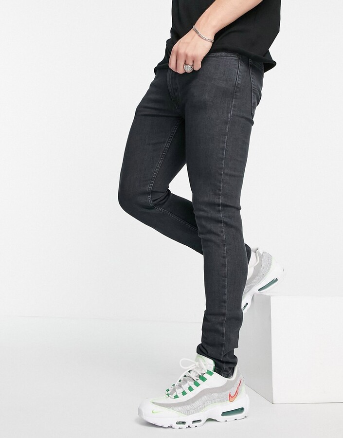 Levi's 519 super skinny fit hi-ball jeans in black overdye wash - ShopStyle