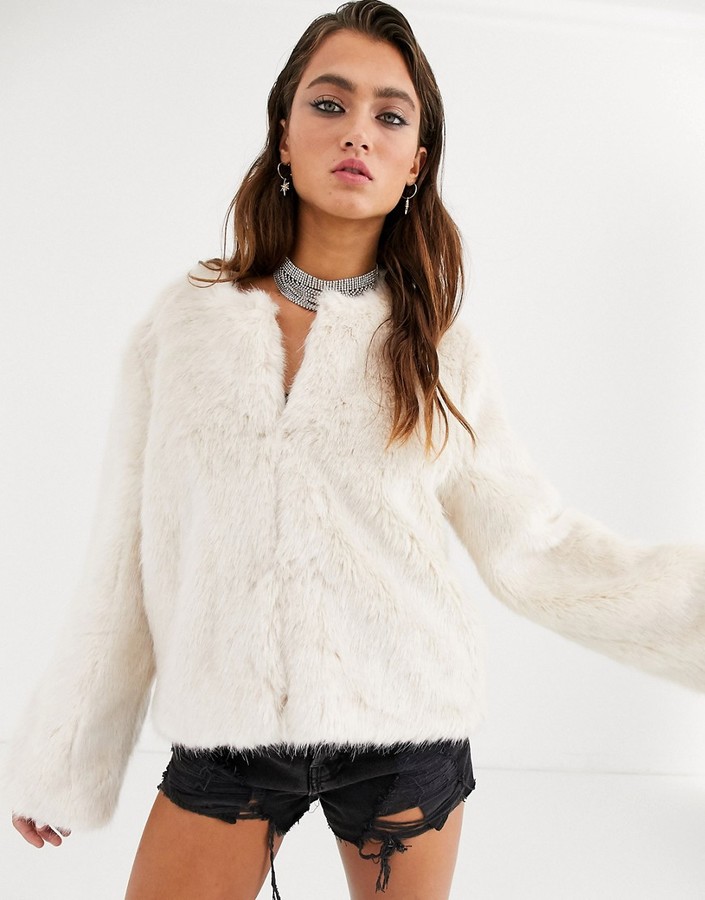 Bershka collarless faux fur coat in ecru - ShopStyle