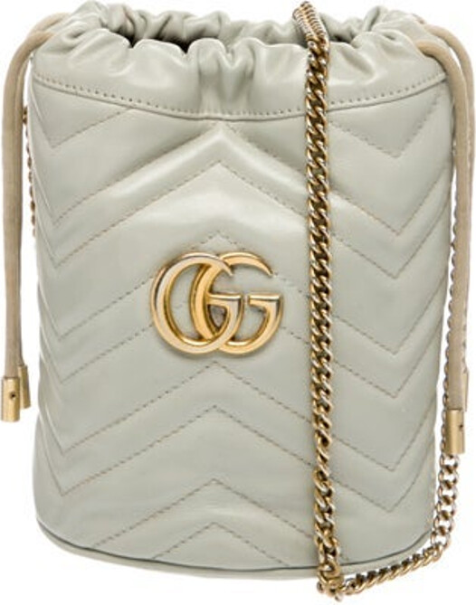 Gucci Suitcase Neutrals Leather Double G Logo Gold-Tone Hardware Chain-Link Shoulder Strap Suede Lining Drawstring Closure at Top Unfortunately, due to restrictions, this item may not be eligible for shipping in all areas.