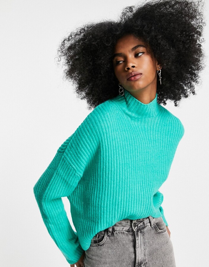 bright green sweater