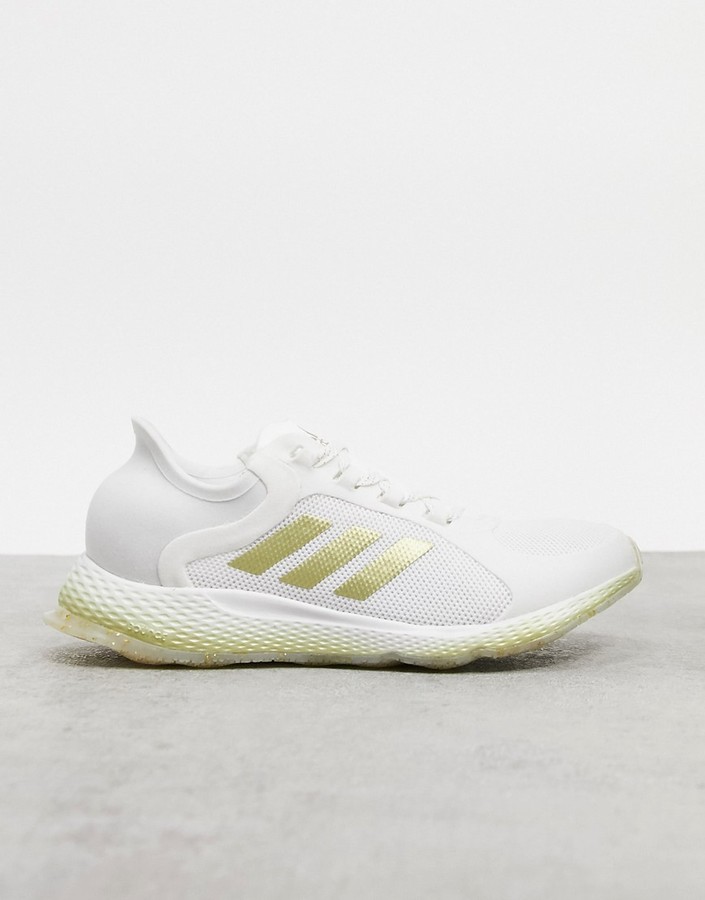 adidas focus breathe sneakers in white and gold - ShopStyle