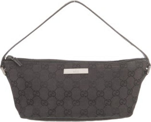 Gucci Top Handle Bag Black Canvas GG Canvas Silver-Tone Hardware Leather Trim Flat Handle Leather Trim Embellishment Logo Jacquard Lining Zip Closure at Top